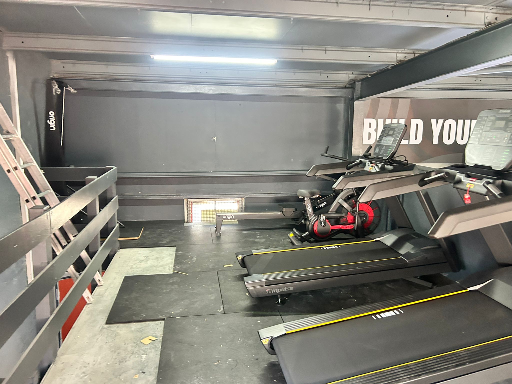Cardio area with treadmills, assault bike and rower